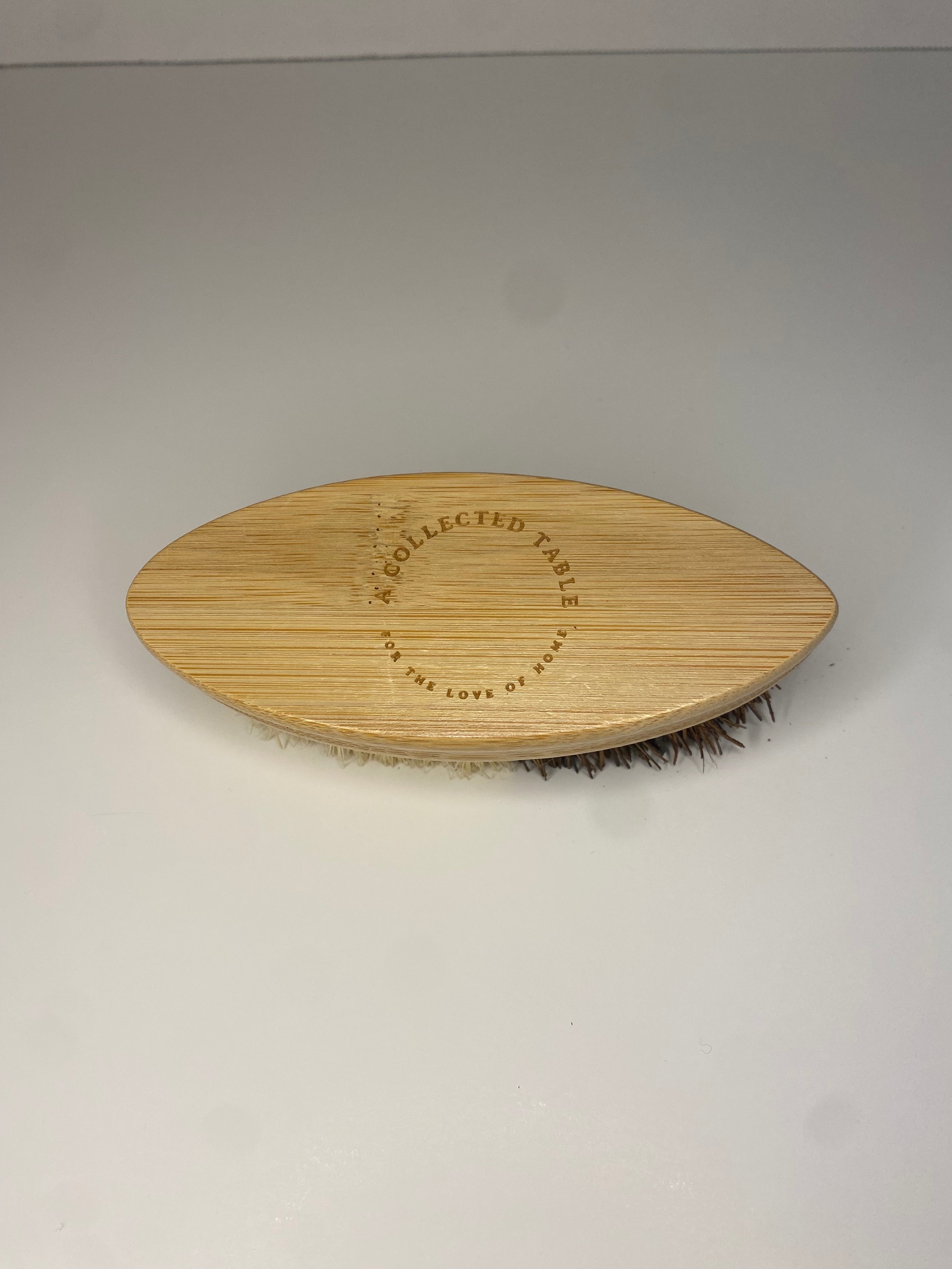 A Collected Table Vegetable Brush